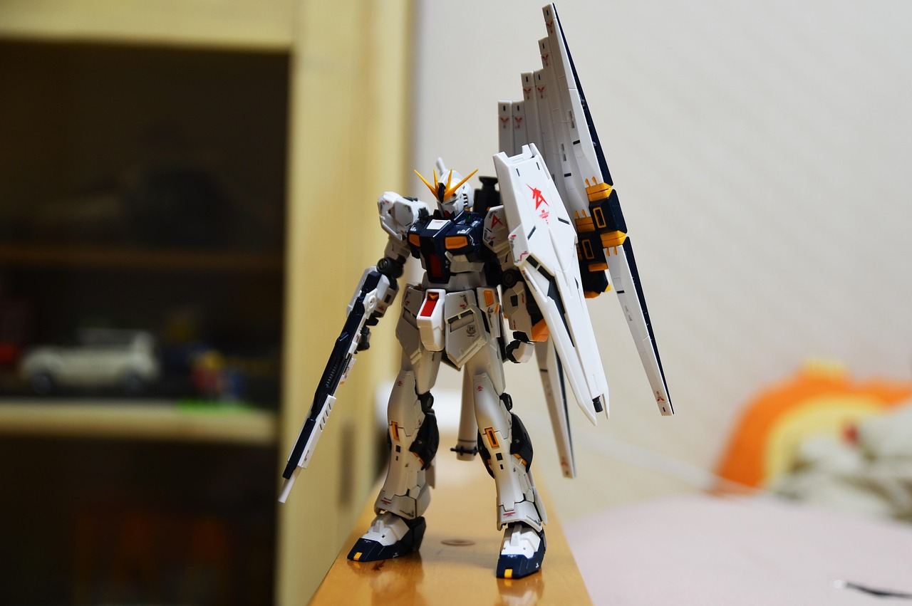 An assembled RX-93 Nu Gundam model photographed on display